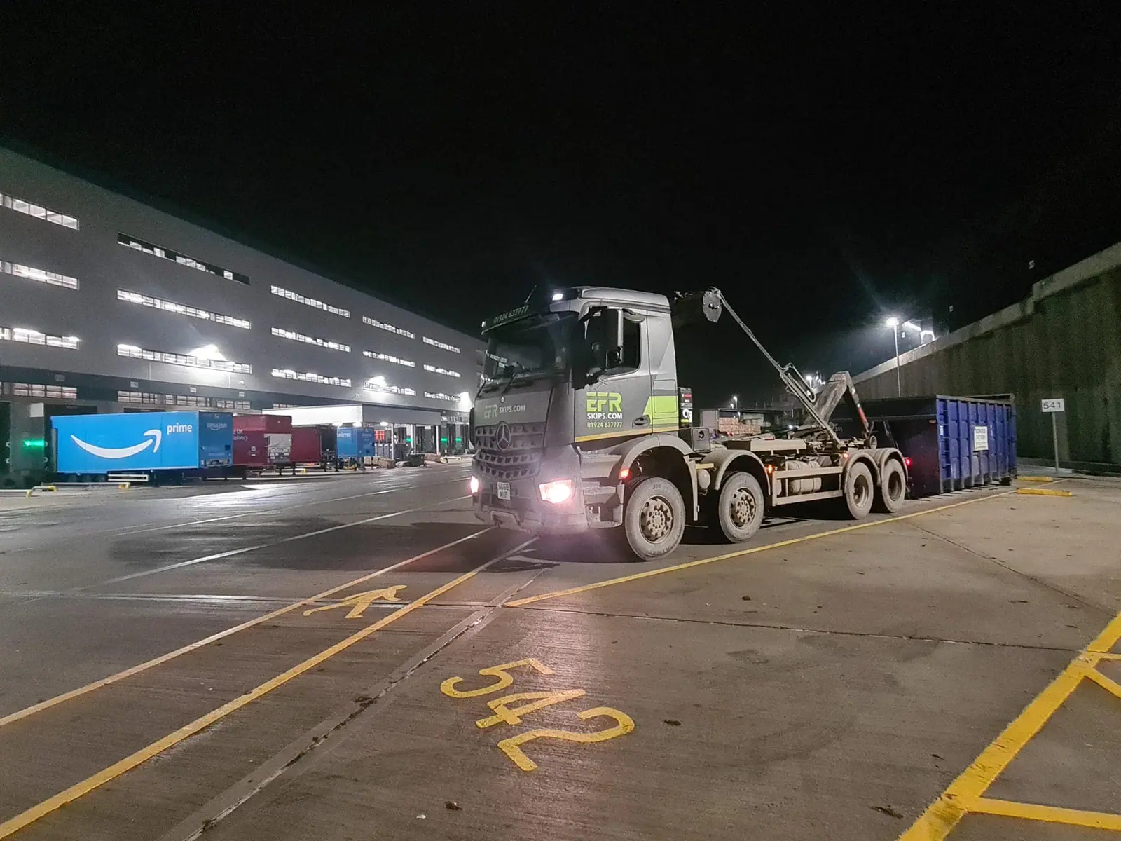 Roll-on-roll-off container in a commercial loading bay